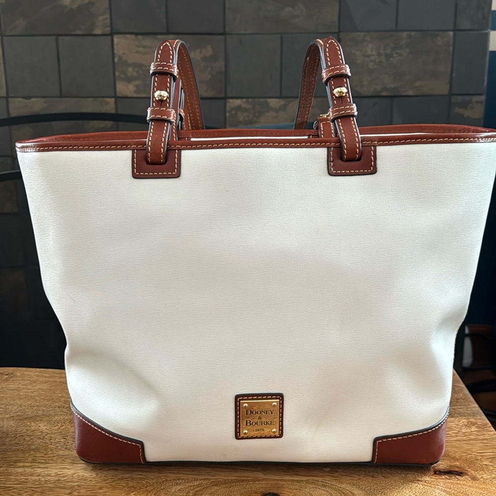 Large white Dooney  bag